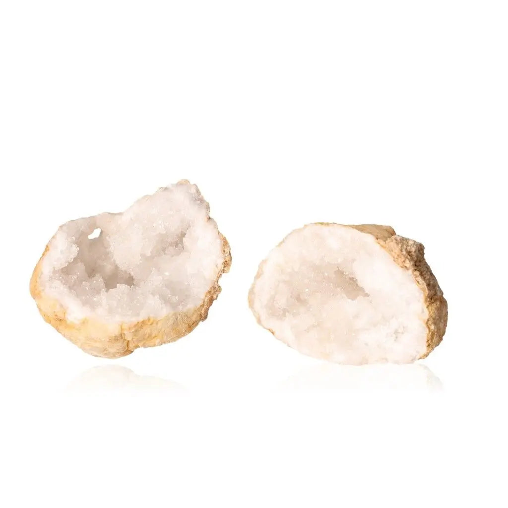 Quartz geode with rugged exterior and milky quartz crystals, weighing 900-1200g, showcasing natural beauty and tranquility.