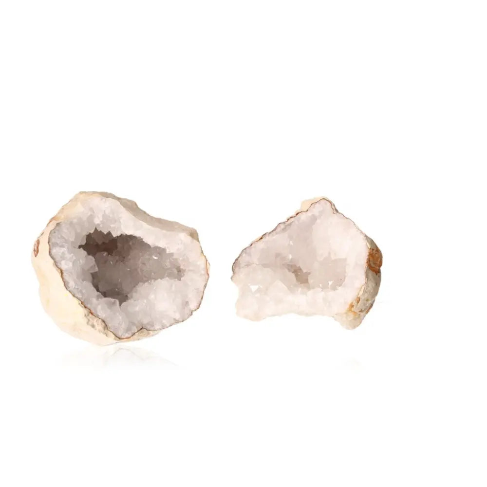 Quartz Geode displaying sparkling white crystals, weight 900-1200g, known for tranquility and energy, earthy exterior open view.