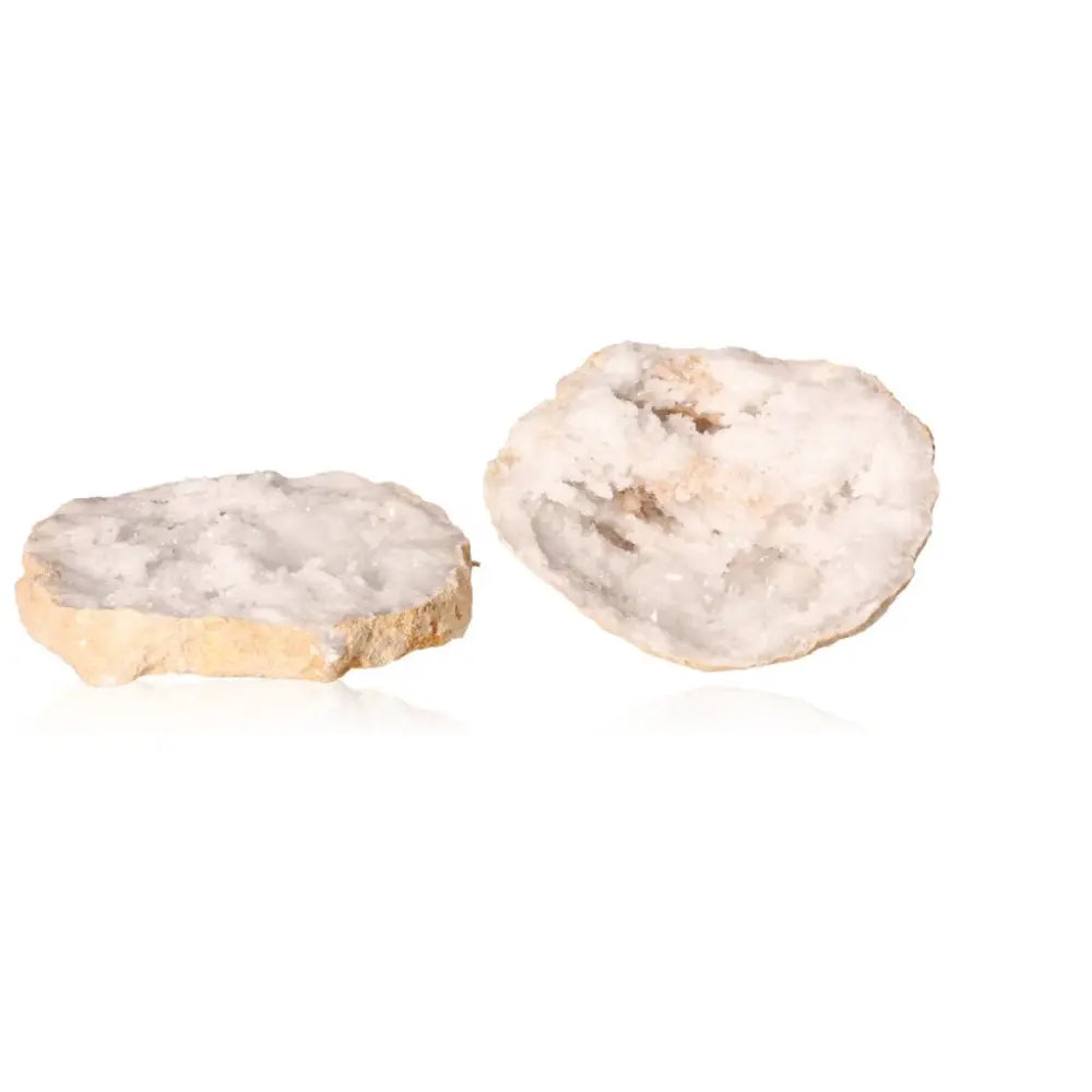 Quartz Geode with cloudy white crystals, showcasing its rugged exterior and sparkling interior, known for purifying and amplifying energy.