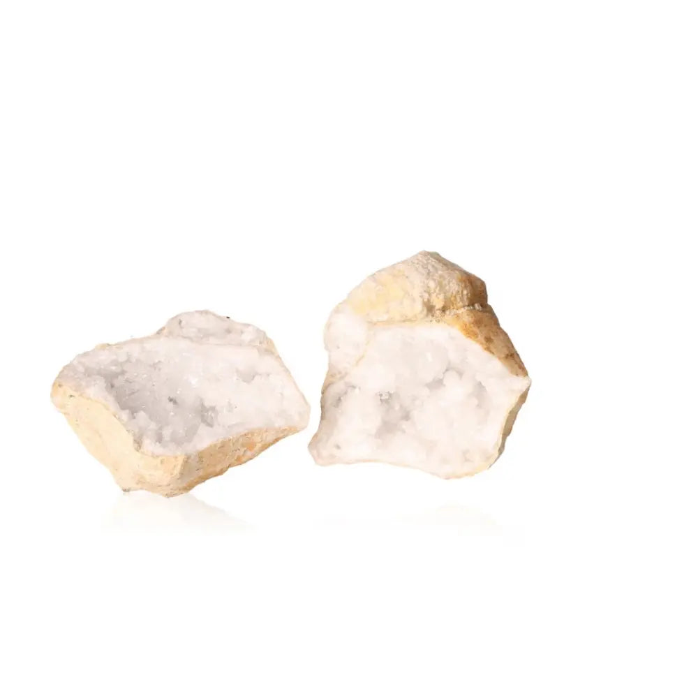 Quartz Geode split open revealing sparkling white crystals, 900-1200g, perfect for adding serenity and elegance to any space.