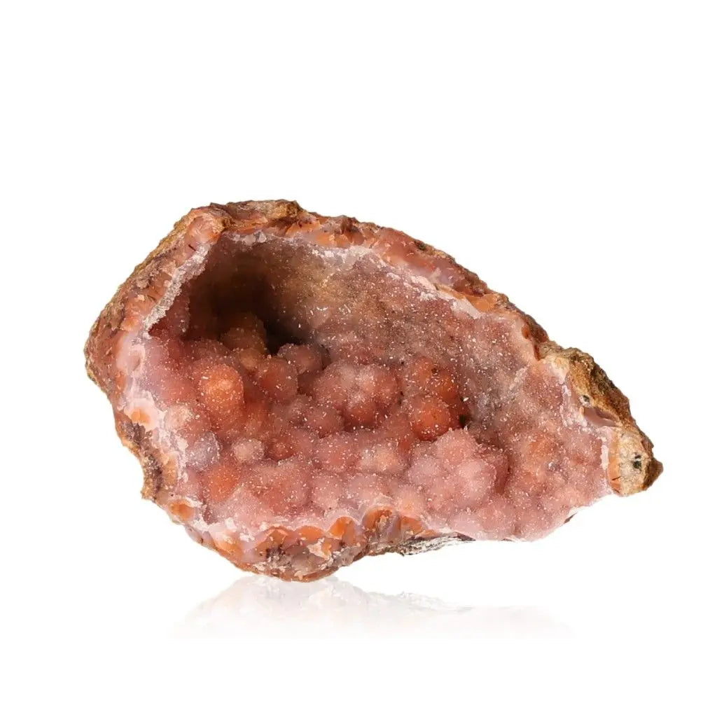 Quartz Stalactite by Sylvia Crystals showcasing natural pink formations, symbolizing luxury and harmony between spirit and matter.