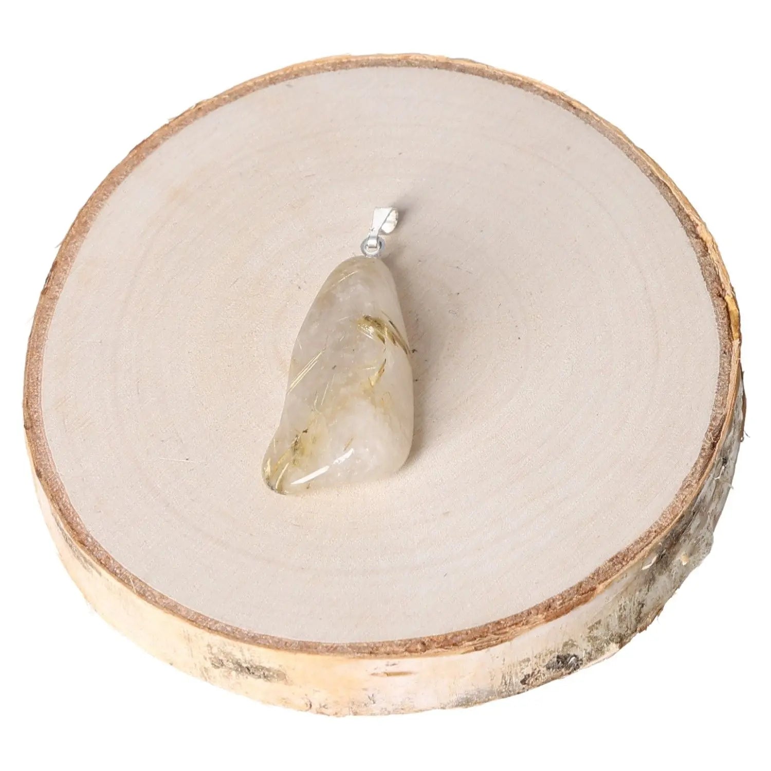 Rock Crystal with Rutile AA Tumbled Pendant on a wooden surface, showcasing transparent crystal with golden rutile threads.
