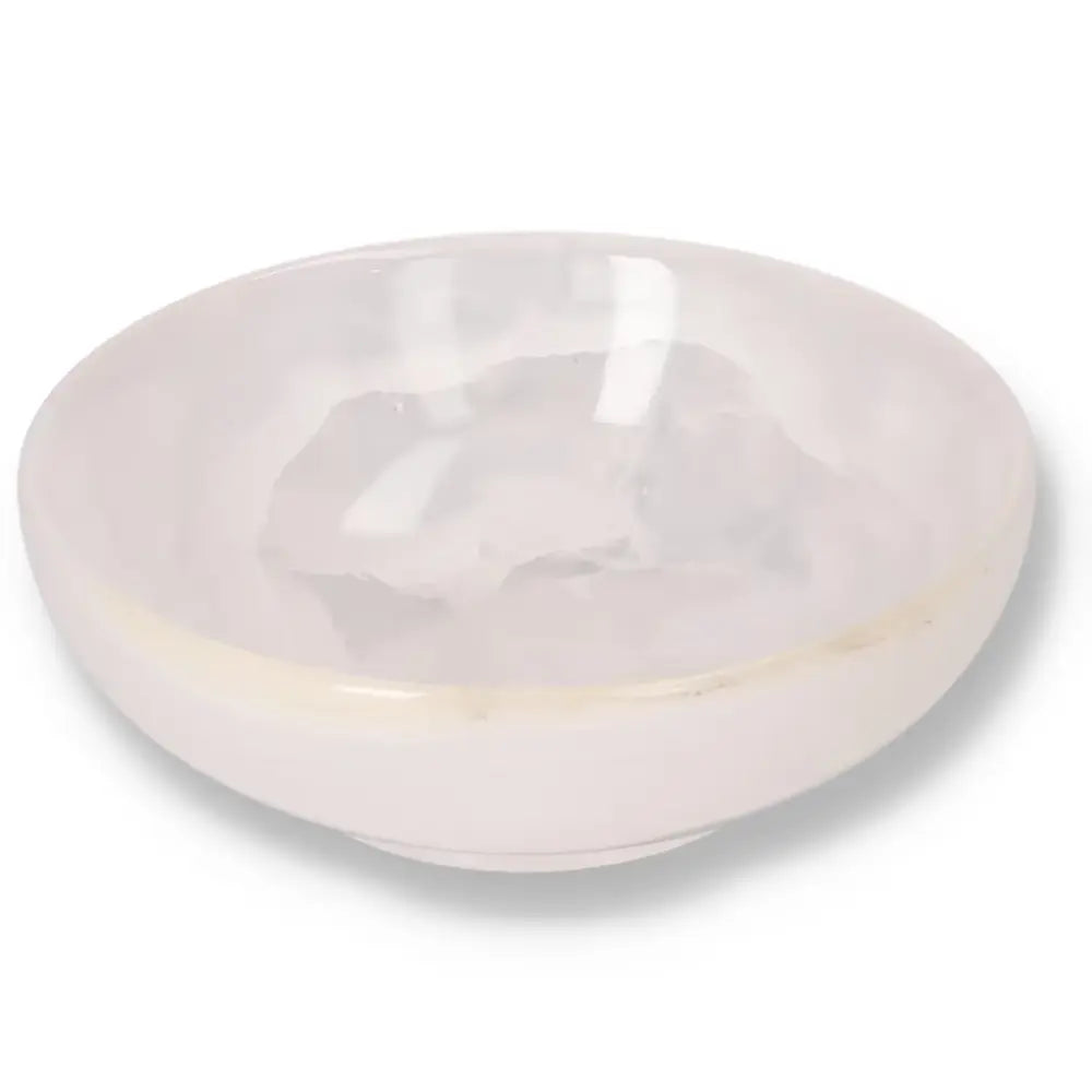Elegant Rose Onyx Bowl with polished surface, showcasing unique veining and soft translucency for a warm, sophisticated décor accent.