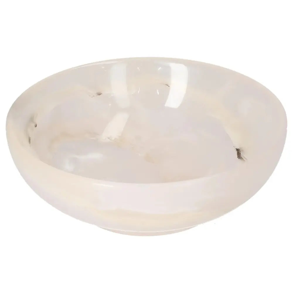 Elegant rose onyx bowl with smooth, polished surface and delicate veining, showcasing natural artistry and warmth for home décor.