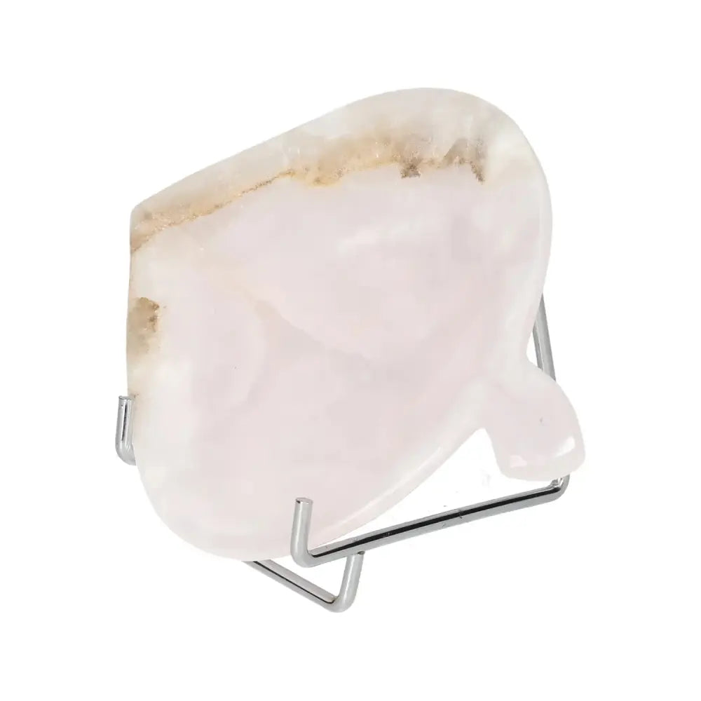 Small rose onyx platter with unique veining and polished surface, displayed on a stand for elegance and natural beauty.