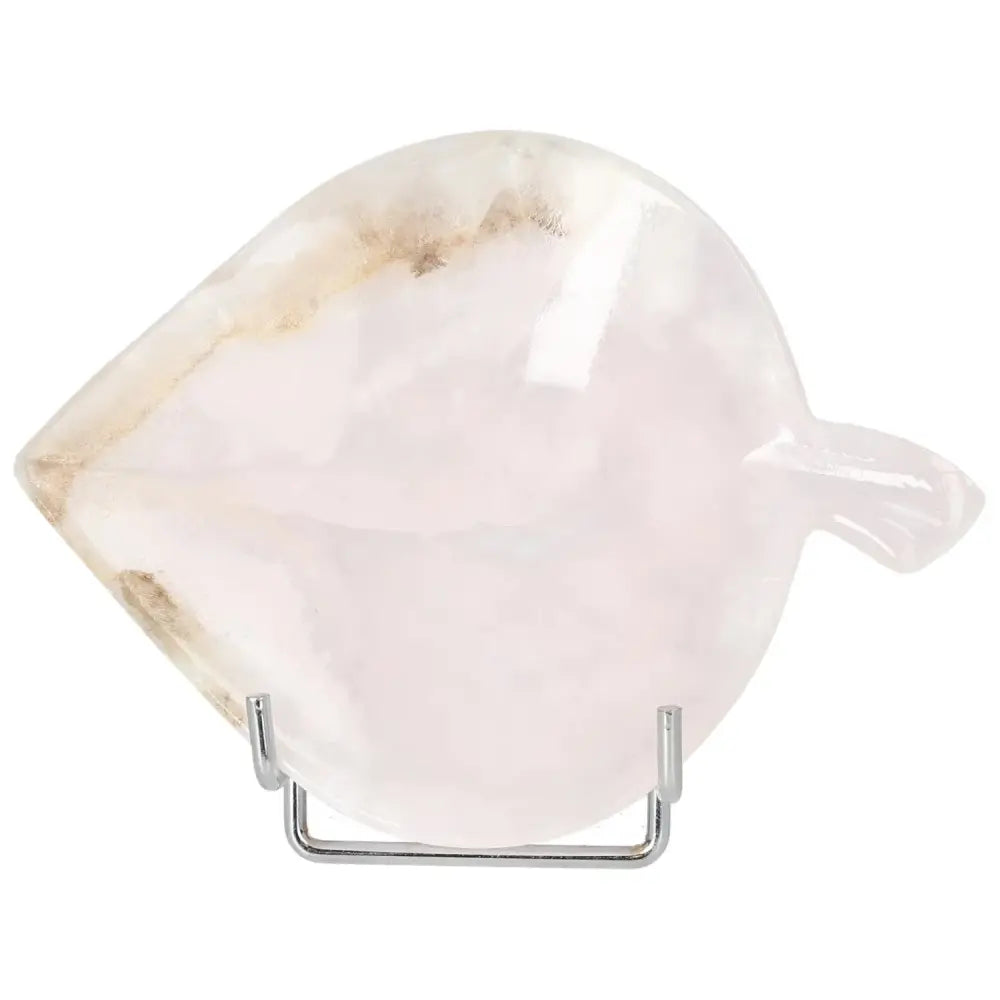 Rose onyx platter with unique veining, featuring a polished surface that enhances warm tones. Perfect for elegant table settings.
