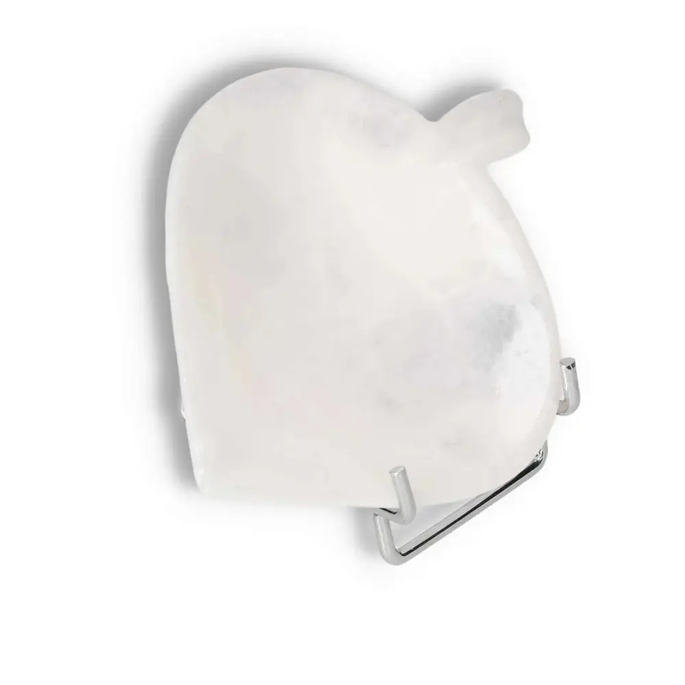 Abstract white stone art sculpture on a metal stand