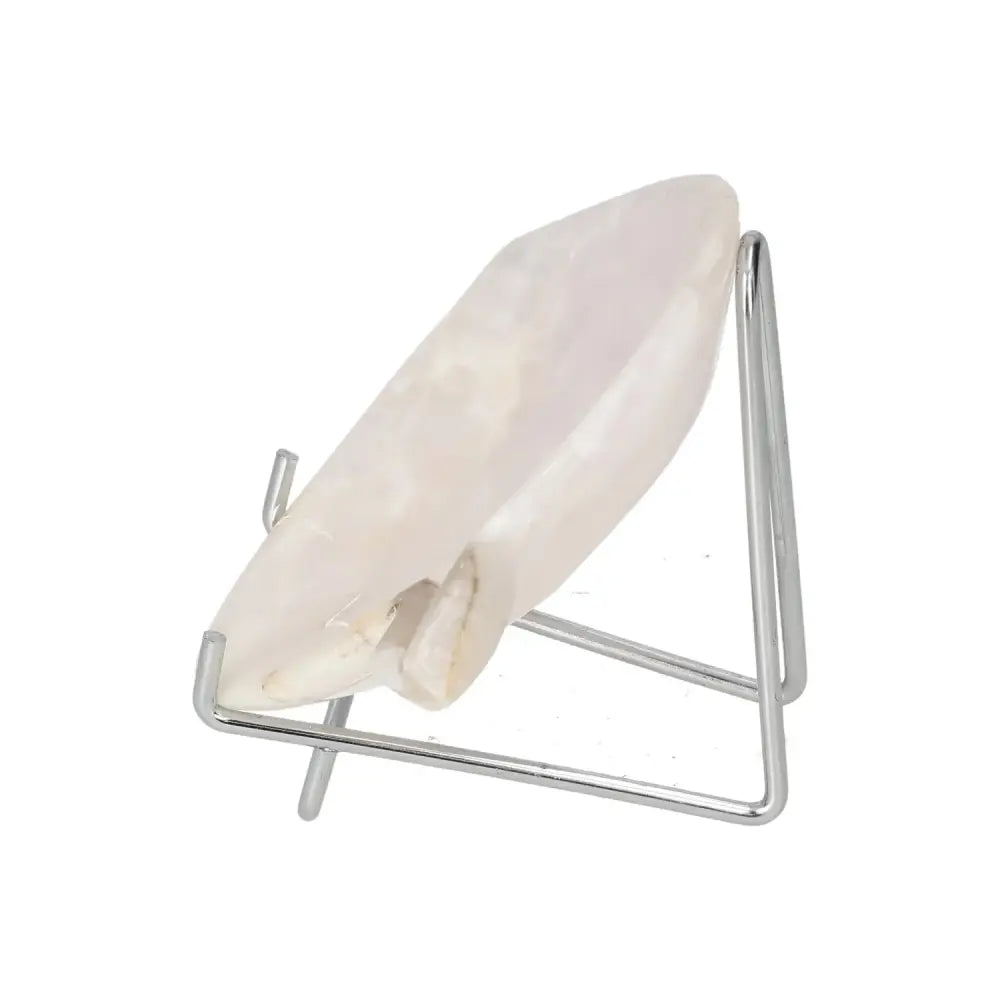 Rose Onyx small platter on display stand, showcasing unique veining and soft hues.