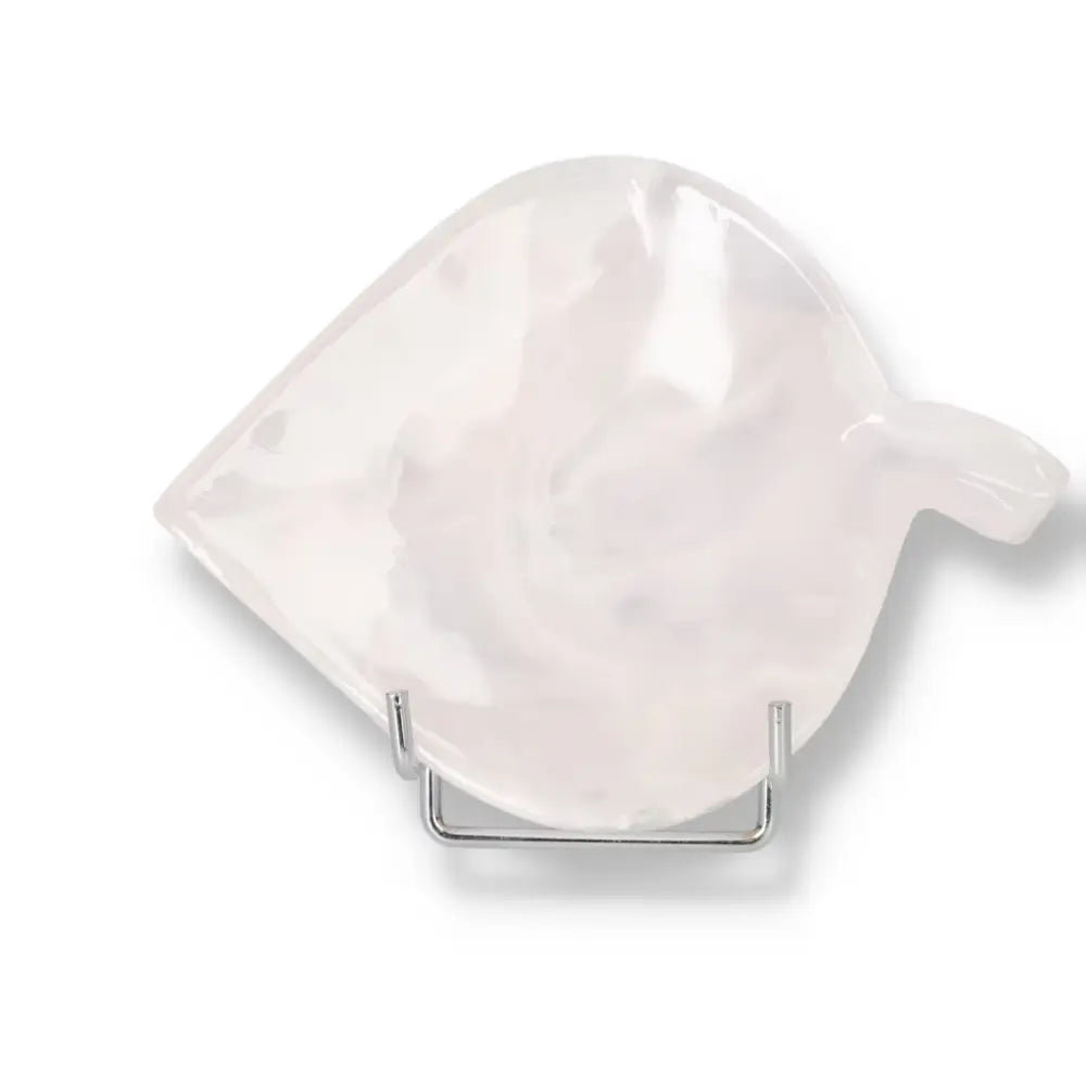 Rose onyx platter with unique color variations and veining, showcasing elegant natural beauty on a polished stand.