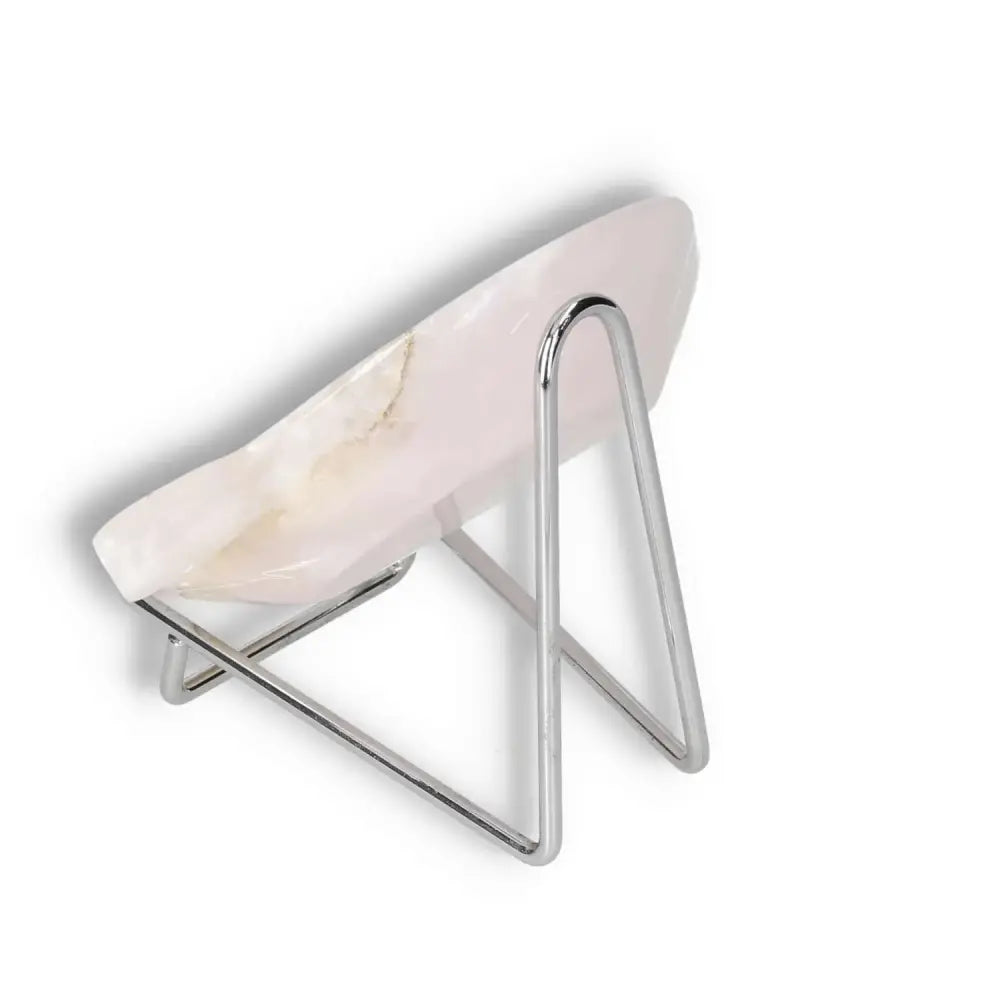 Rose Onyx Platter with unique veining on a sleek metal stand, ideal for enhancing elegant table settings with natural beauty.