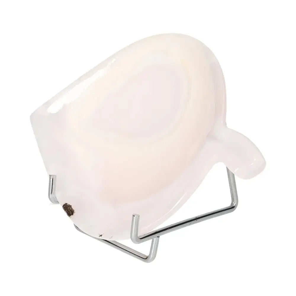 Rose Onyx Platter with unique veining, displayed on a metal stand, showcasing elegant light reflections and natural beauty.