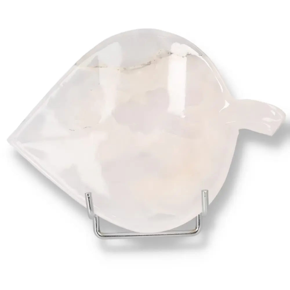 Rose onyx platter with unique veining on a metal stand, showcasing elegance and natural beauty, perfect for decor or serving.