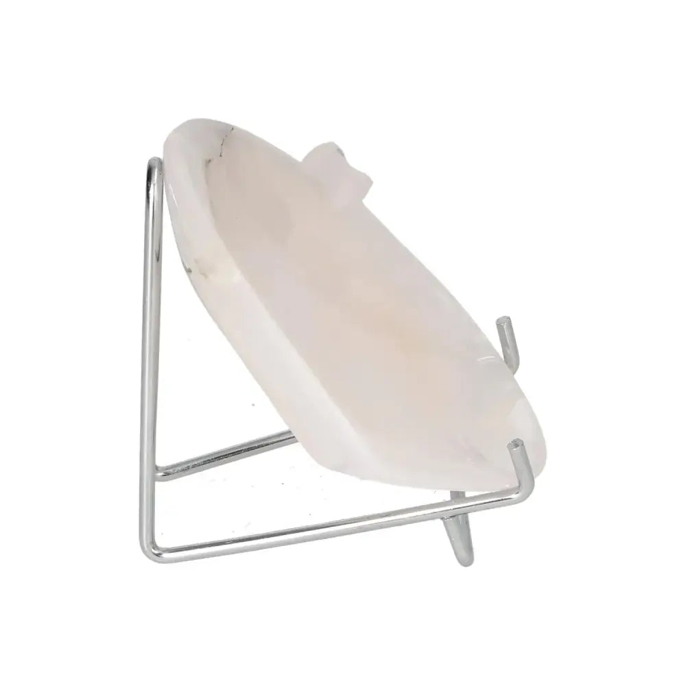 Elegant rose onyx platter with unique veining, displayed on a metal stand, perfect for serving or decor enhancement.