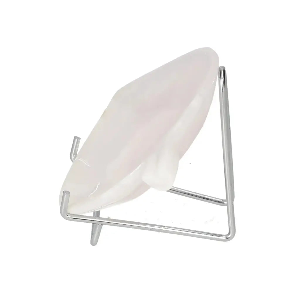 Rose Onyx Platter displayed on a stand, showcasing its polished surface and unique pink veining for elegant tablescape settings.