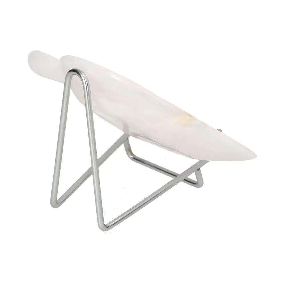 Rose onyx platter displayed on a metal stand, showcasing its elegant curves and delicate pink hues. Ideal for elevating any tablescape.