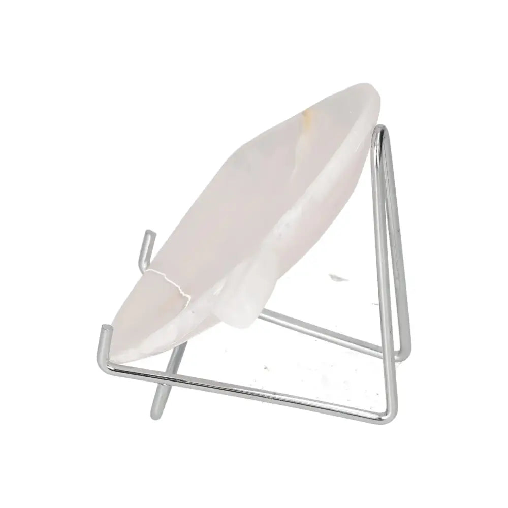 Rose onyx platter on a metal stand, showcasing unique veining and polished surface for elegant table decor.