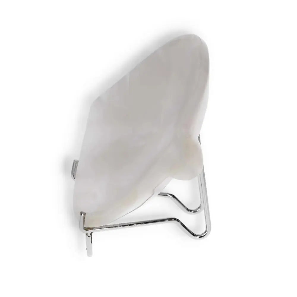 Elegant rose onyx platter displayed on a metal stand, highlighting its unique veining and polished surface.