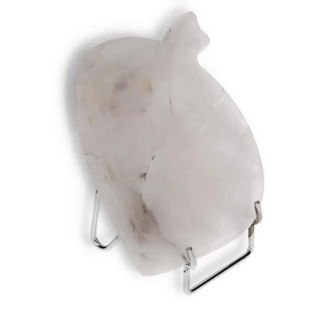 Rose Onyx Platter on stand showcasing unique veining and polished surface.