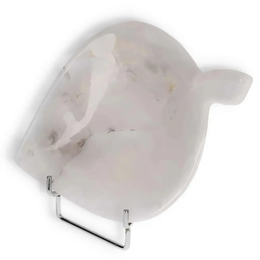 Rose Onyx Platter with unique veining on display stand, showcasing elegant tableware design in delicate rose hues.