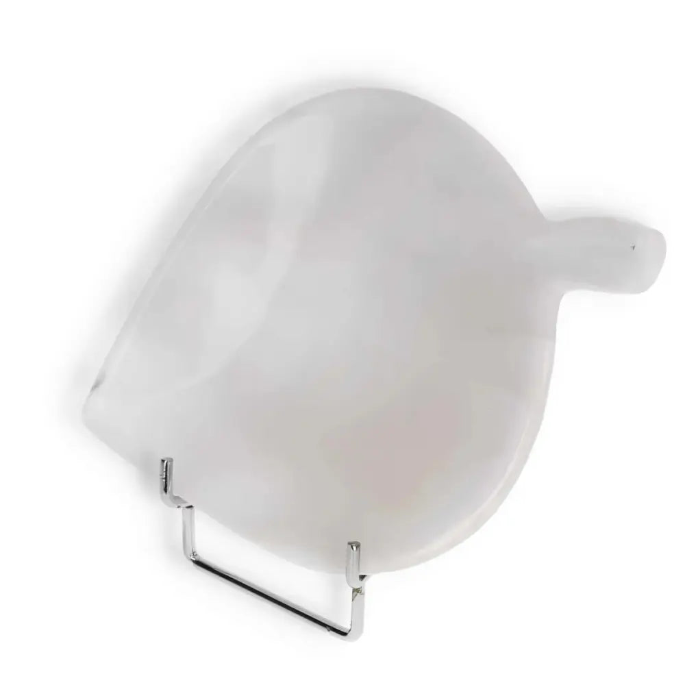 Elegant rose onyx platter with unique veining on a stand, reflecting light with soft, warm tones. Perfect for serving delicacies.