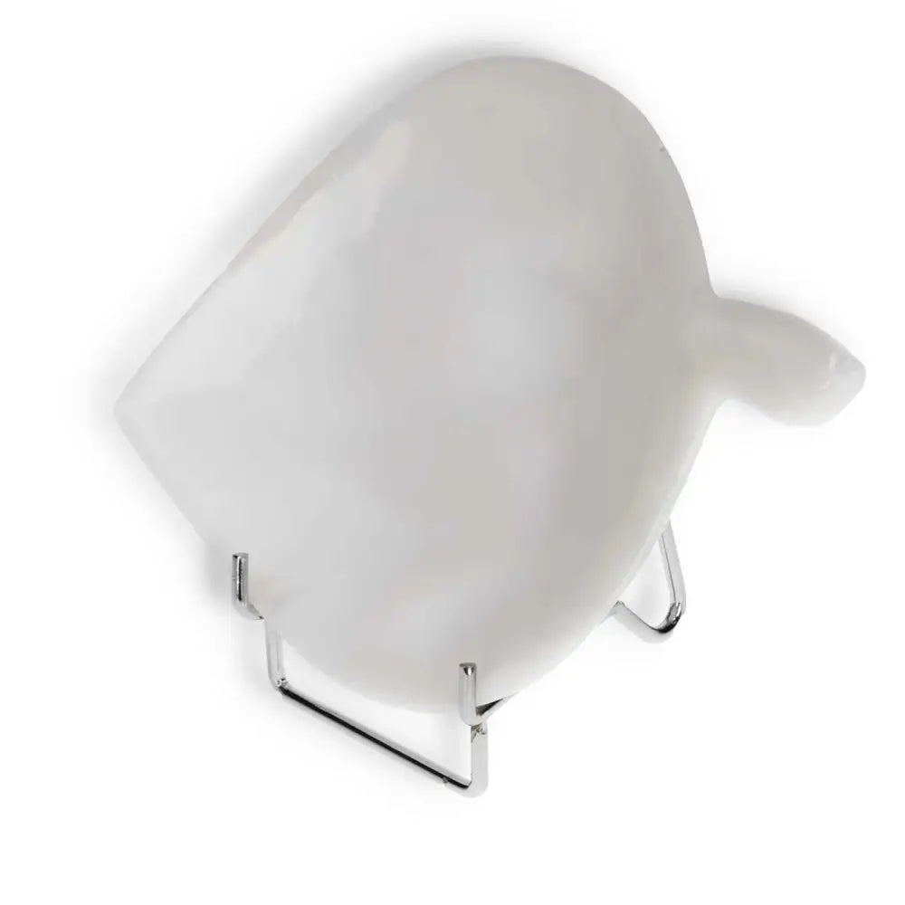 Elegant white onyx platter on a silver stand, showcasing smooth polished surface and unique veining, perfect for sophisticated dining.