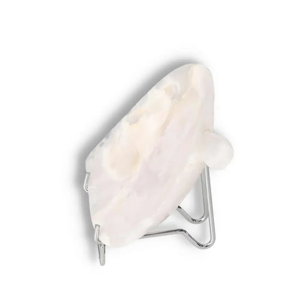 Rose Onyx Platter with unique veining, displayed on a stand, showcasing its polished, elegant surface for luxury tablescapes.