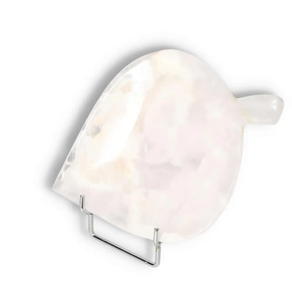 Rose onyx platter with smooth surface and delicate pink hues, showcasing unique color variations and natural veining. Ideal for elegant tablescapes.