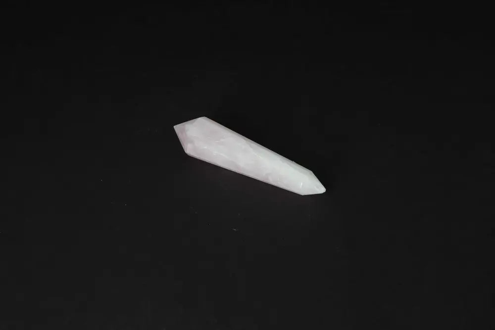 Rose Quartz Point for emotional healing and heart chakra work, radiating love and harmony in relationships, ideal for meditation.