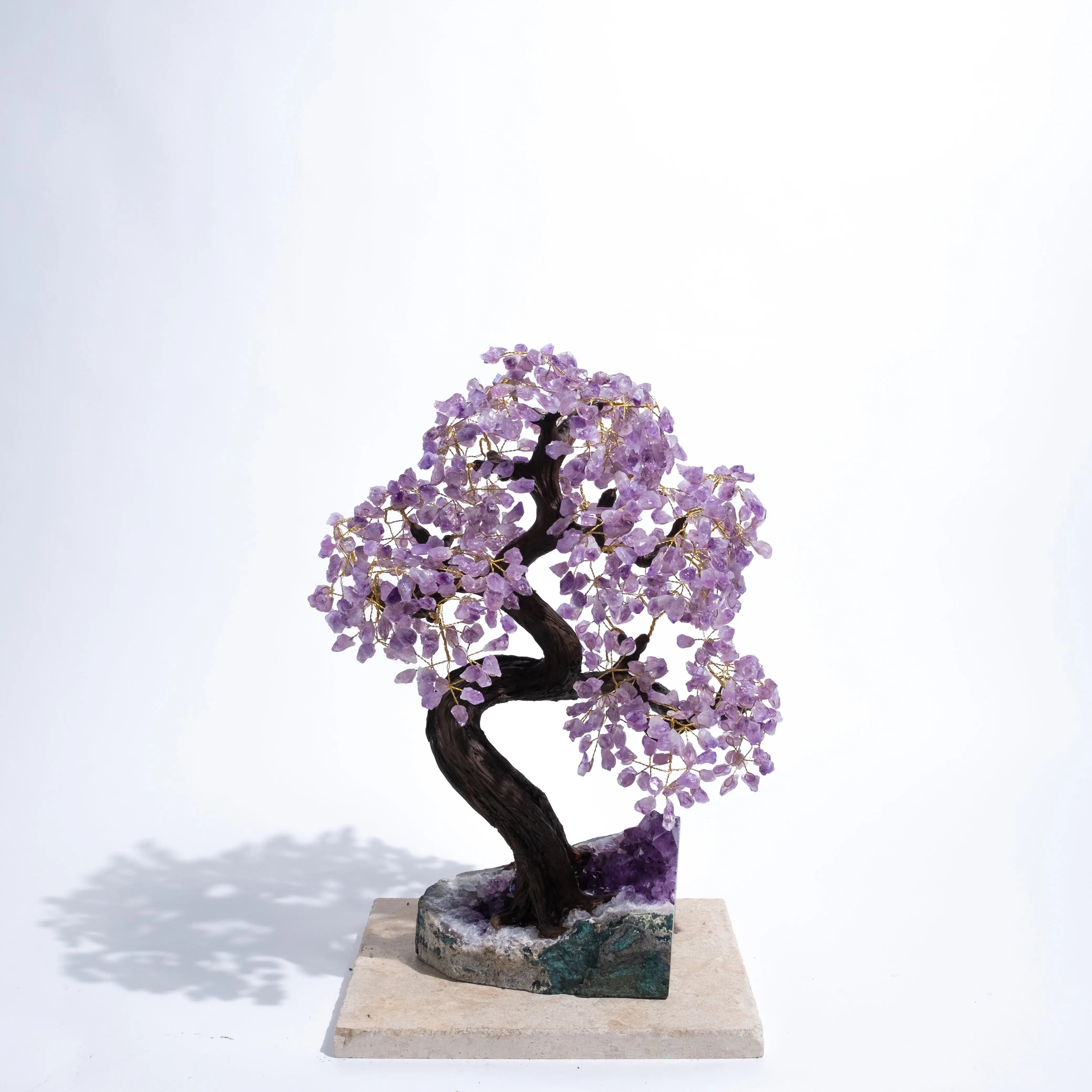 Amethyst Crystal Bonsai Tree with purple gemstone leaves, symbolizing tranquility and spiritual harmony, on a white background.