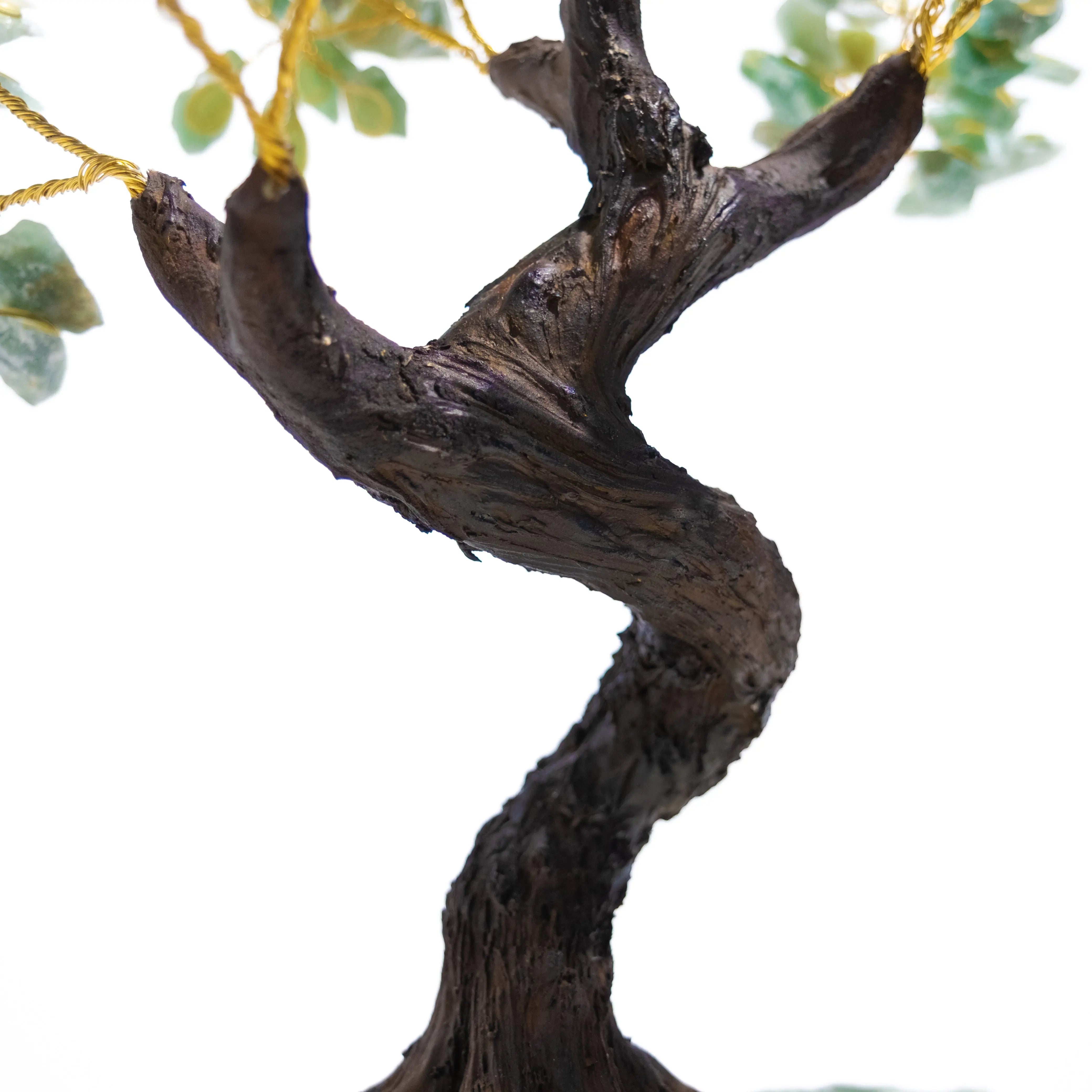 Close-up of handcrafted rough Aventurine Crystal Bonsai Tree trunk, symbolizing growth, abundance, and positive energy.
