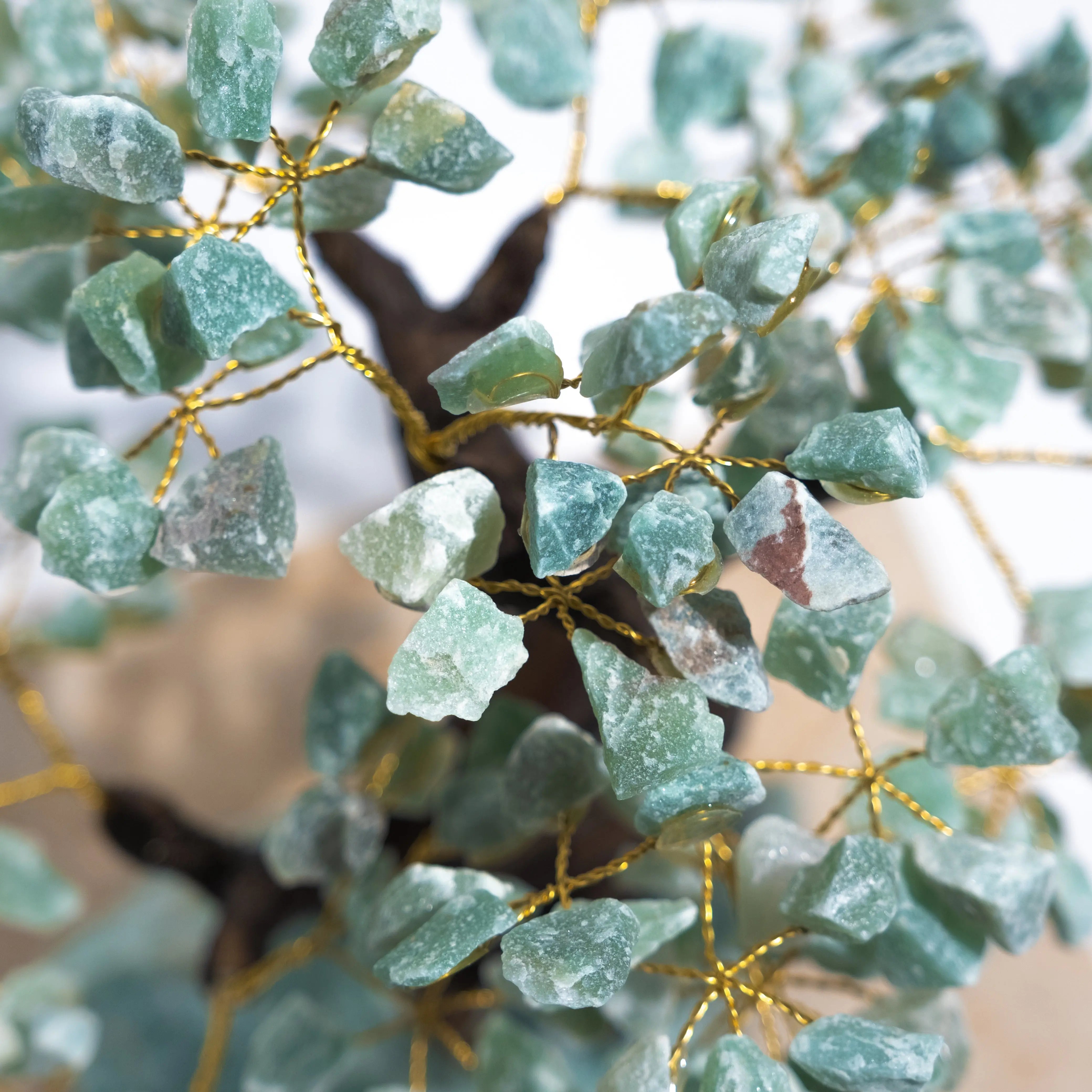 Close-up of handcrafted Aventurine Crystal Bonsai Tree showcasing green crystals for prosperity and positive energy.