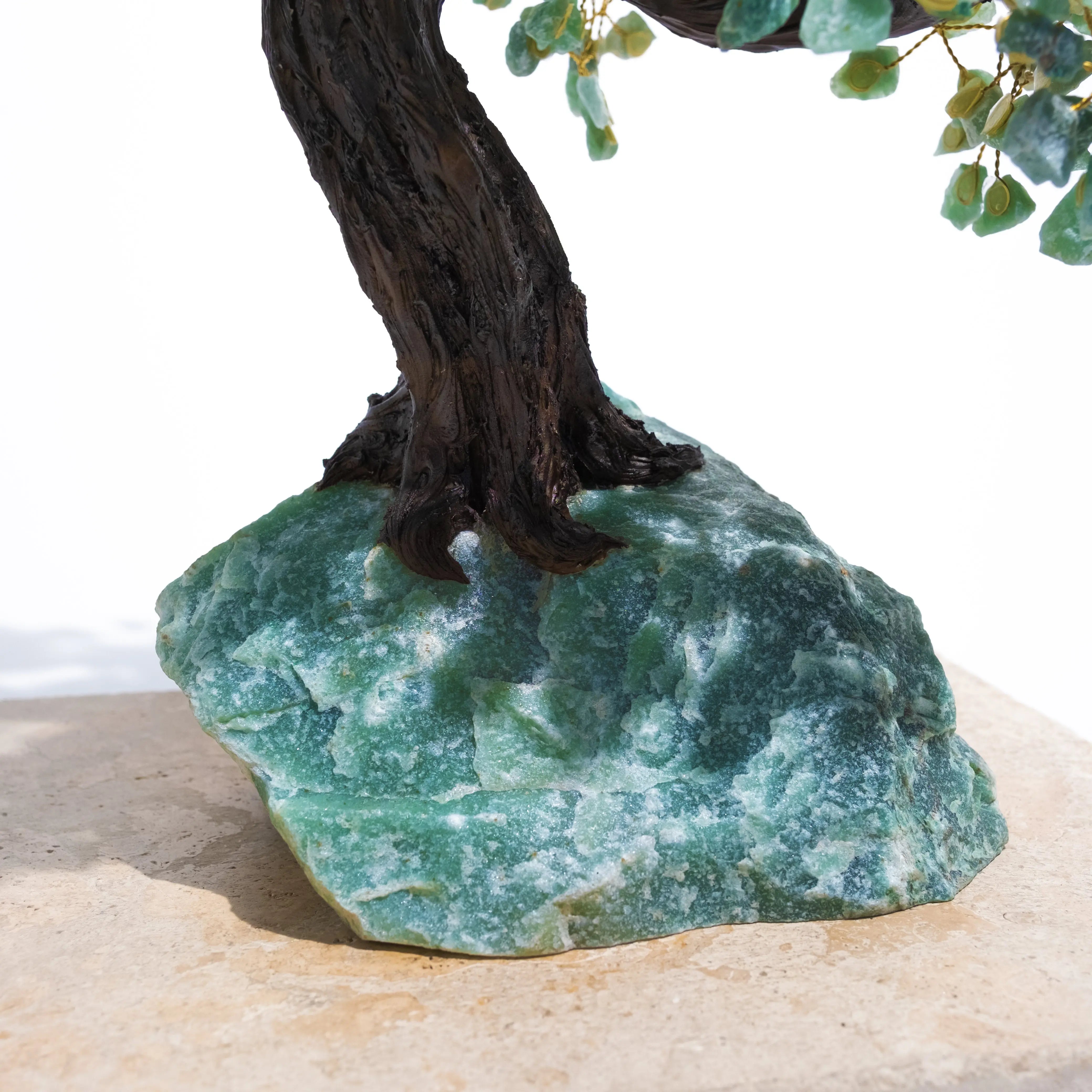 Close-up of handcrafted Rough Aventurine Tree base showcasing green aventurine crystal for prosperity and positive energy.