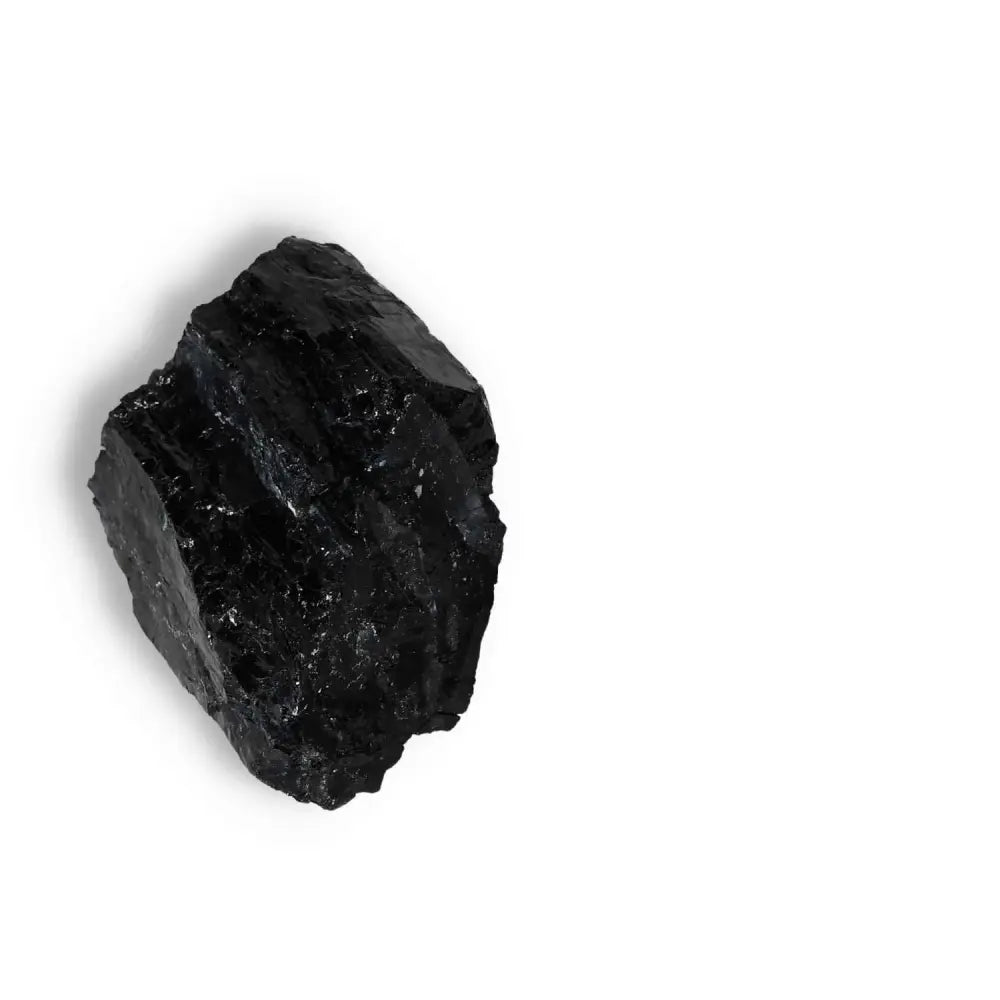 Rough Black Tourmaline Druze L crystal with cleansing and grounding properties, perfect for energy transformation and mental balance.