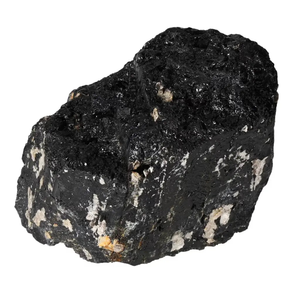 Rough Black Tourmaline Druze L stone, known for cleansing negative energies, displayed against a white background.