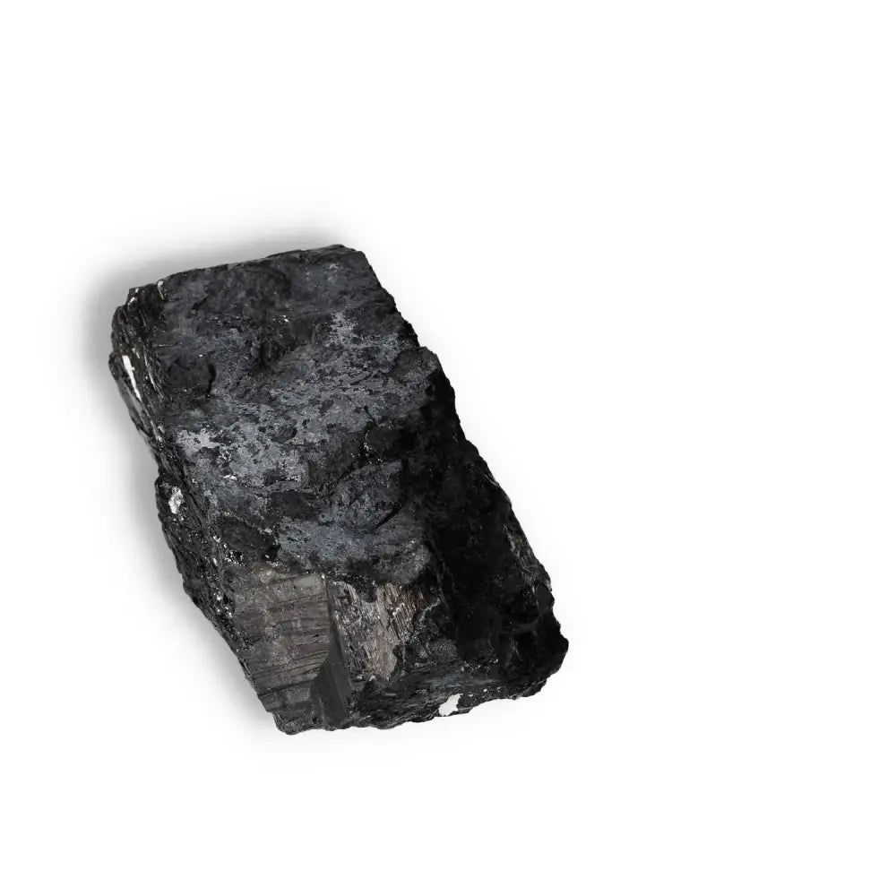 Rough Black Tourmaline Druze crystal for purifying and balancing environments, enhancing energy cleansing and negative energy removal.