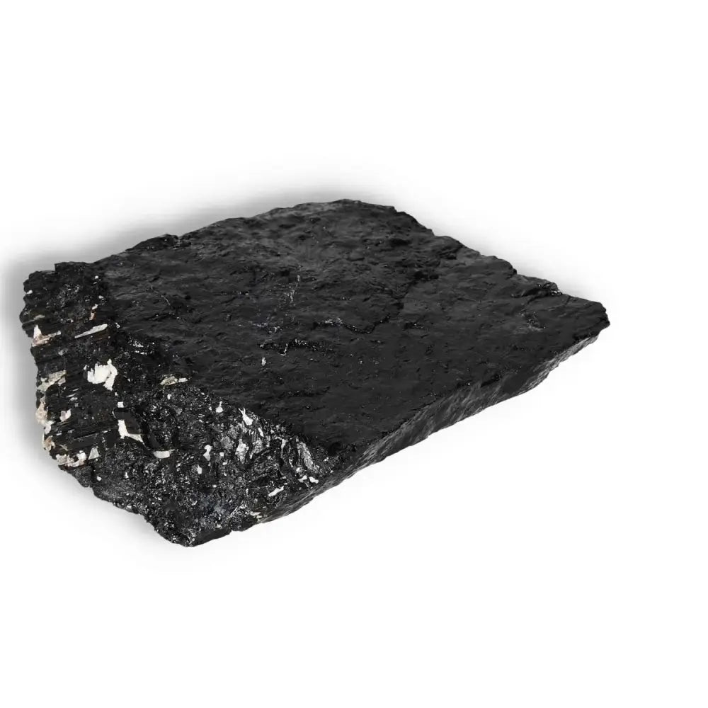 Rough Black Tourmaline Druze crystal from Sylvia Crystals, known for protection and purification, enhances spiritual collections.