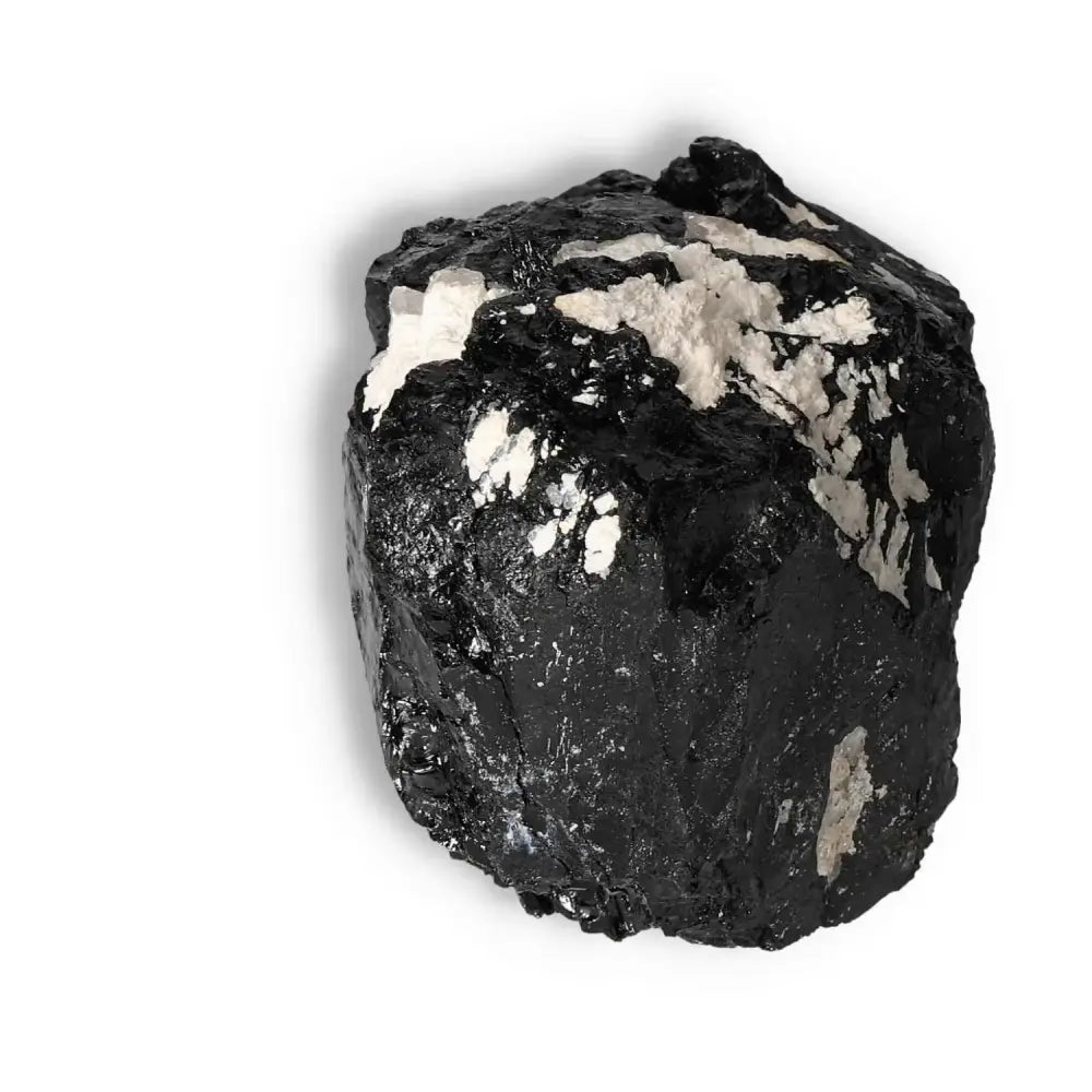 Rough Black Tourmaline Druze from Sylvia Crystals, known for cleansing negative energies and enhancing grounding and mental balance.