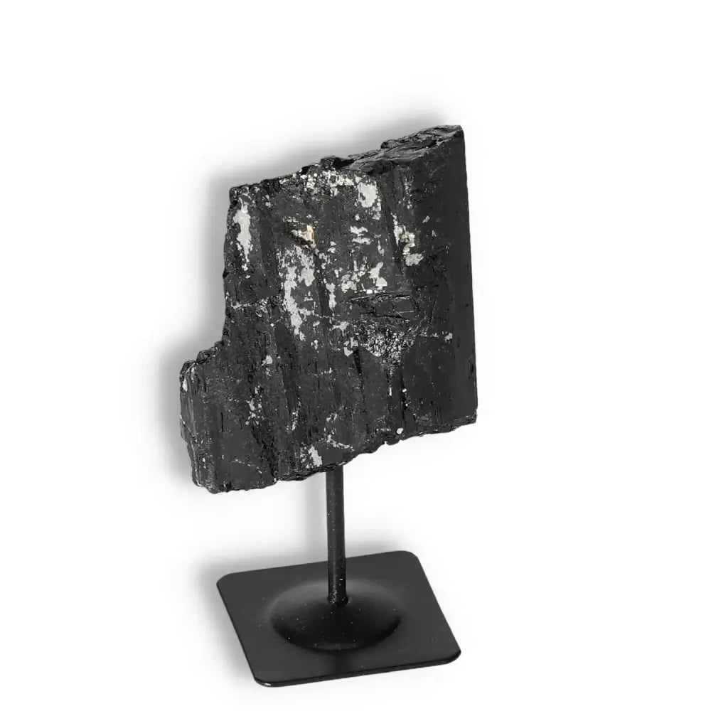 Rough Black Tourmaline on Metal Stand M by Sylvia Crystals, ideal for energy cleansing and negative energy neutralization.