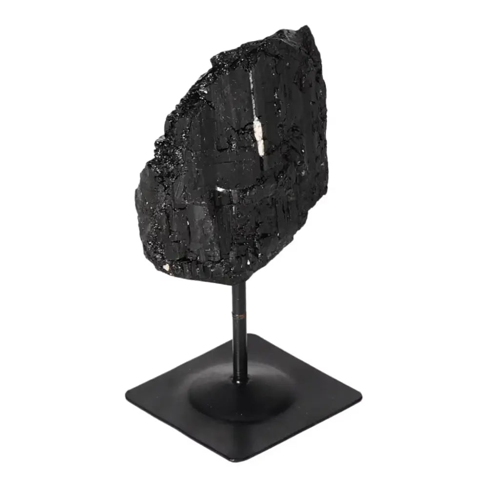 Rough Black Tourmaline on Metal Stand S from Sylvia Crystals, embodying luxury and spirituality in polished elegance.