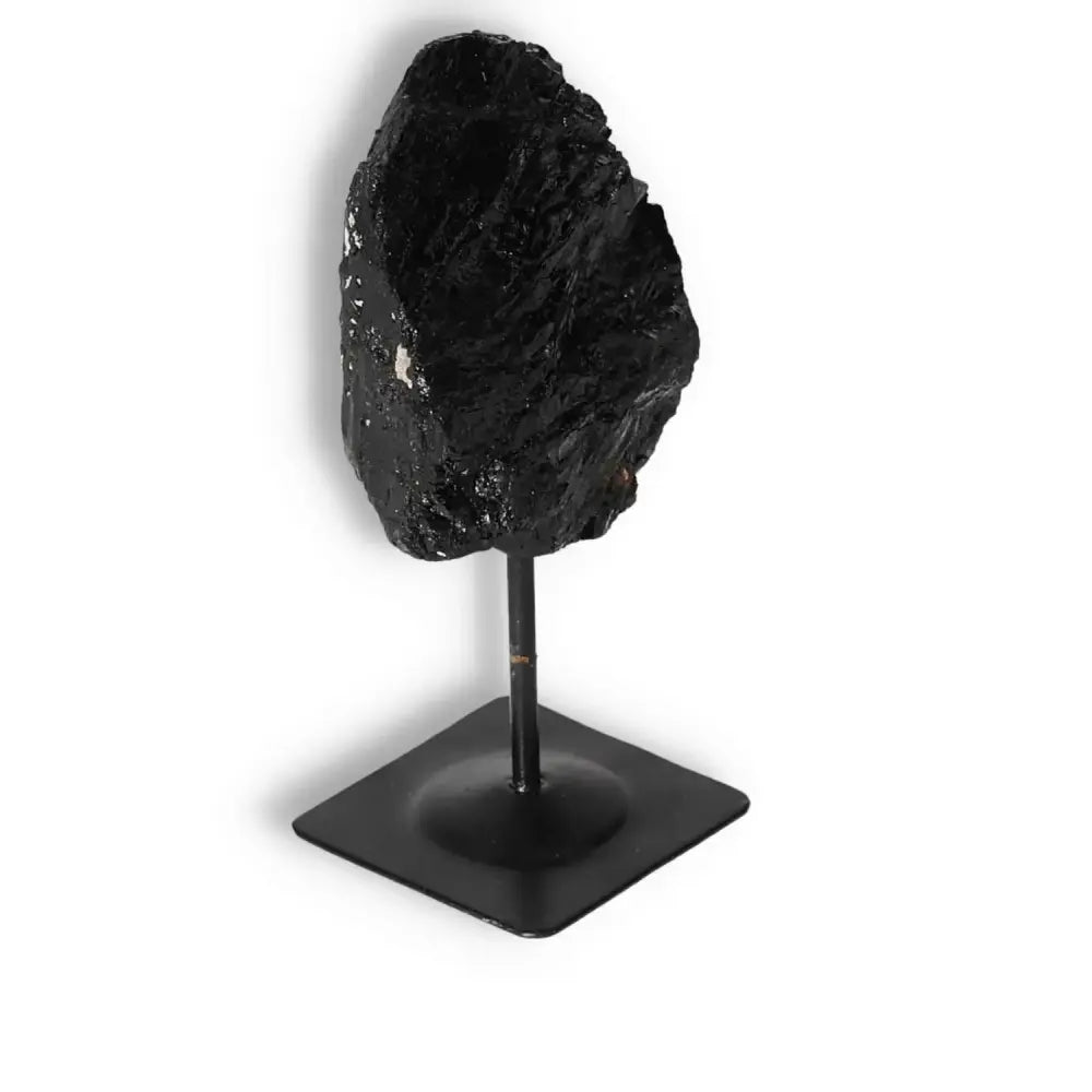 Rough Black Tourmaline on Metal Stand S, luxury crystal by Sylvia Crystals, known for cleansing and transforming energy.