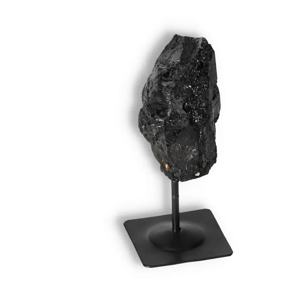Rough Black Tourmaline with Metal Stand S from Sylvia Crystals, elegant and spiritual, ideal for cleansing negative energies.