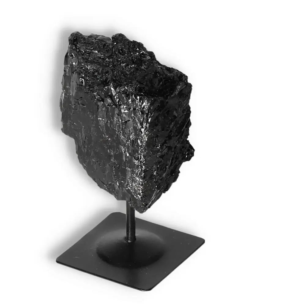 Rough Black Tourmaline with Metal Stand S for energy cleansing and emotional healing by Sylvia Crystals.