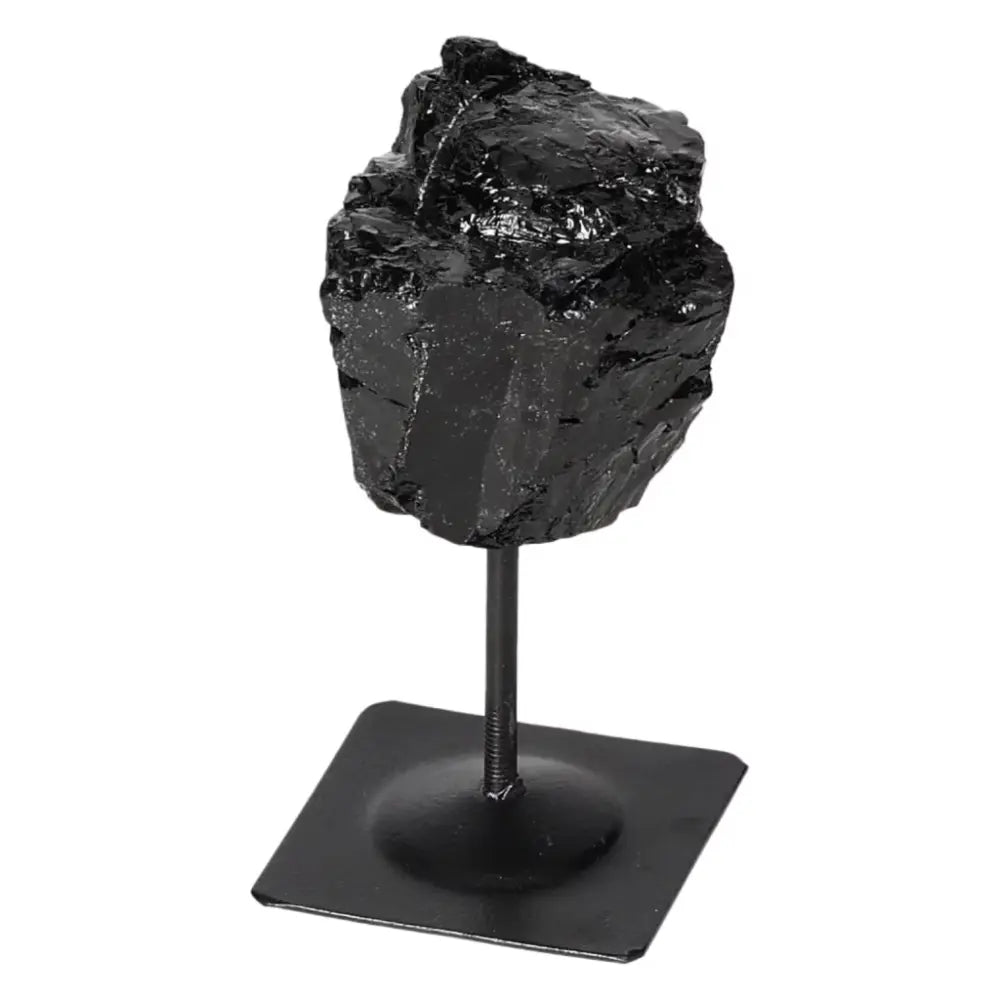 Rough Black Tourmaline with Metal Stand S by Sylvia Crystals, perfect for energy cleansing and healing, displayed elegantly.