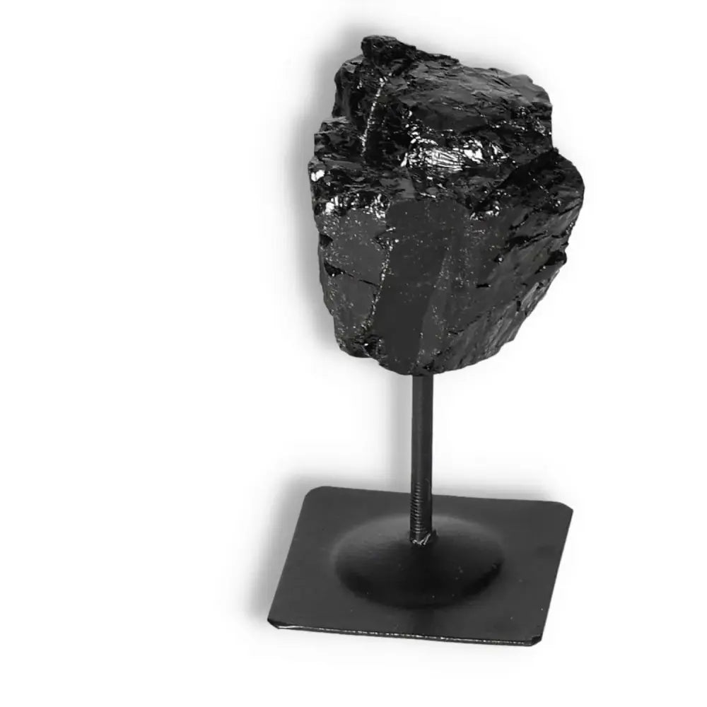 Rough Black Tourmaline with Metal Stand S from Sylvia Crystals, ideal for cleansing and transforming negative energies.