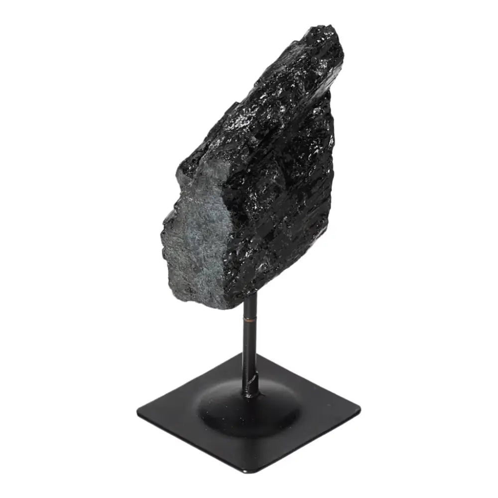 Rough Black Tourmaline on Metal Stand S for energy cleansing, by Sylvia Crystals. Premium spiritual tool for transforming energies.