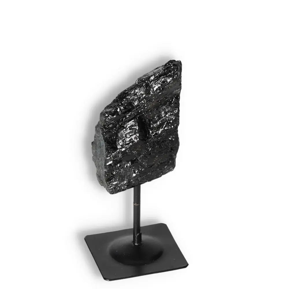 Rough Black Tourmaline with Metal Stand S from Sylvia Crystals for neutralizing negative energies.
