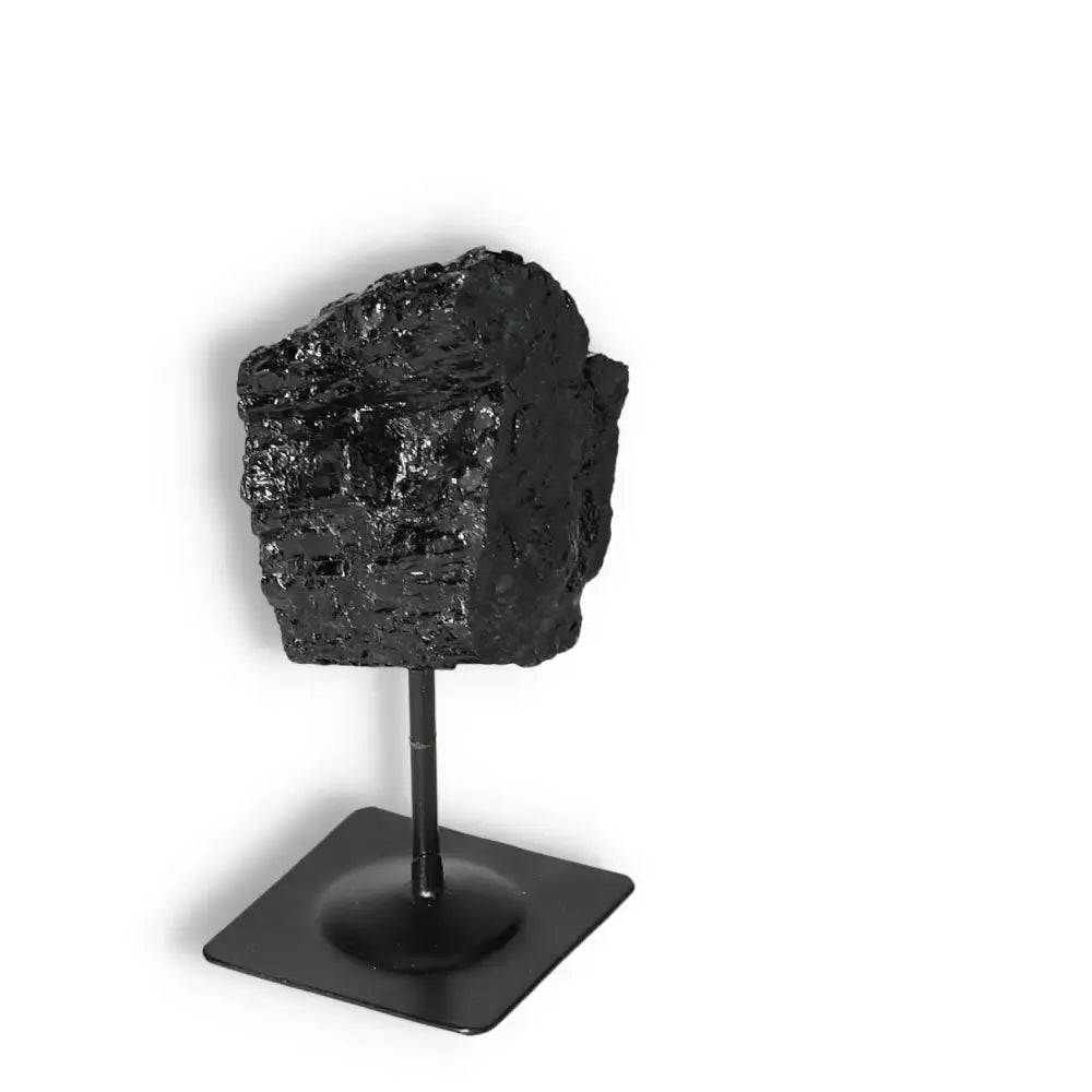 Rough Black Tourmaline on Metal Stand S from Sylvia Crystals, ideal for energy cleansing and aesthetic display.