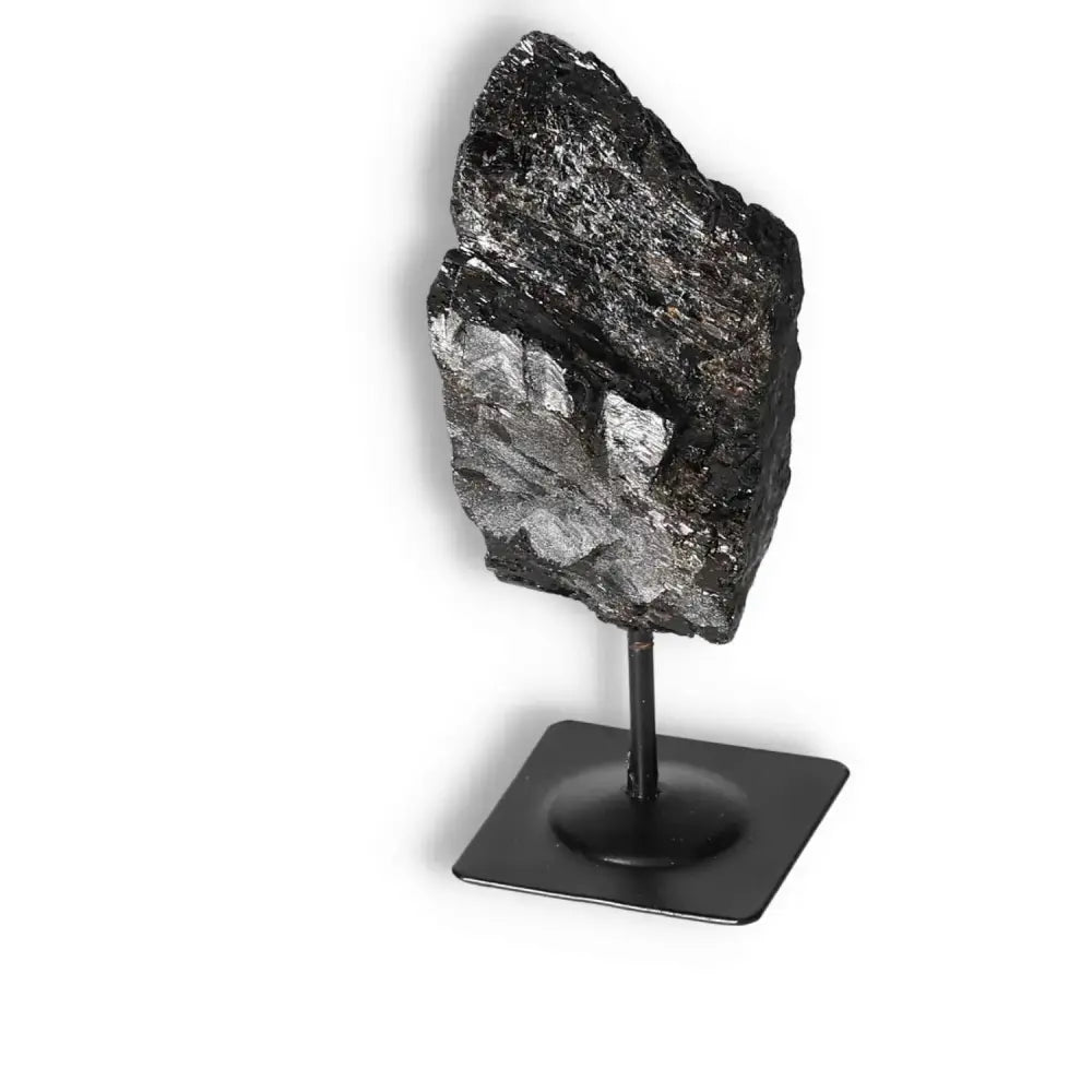 Rough Black Tourmaline on metal stand, perfect for cleansing energy, from Sylvia Crystals.