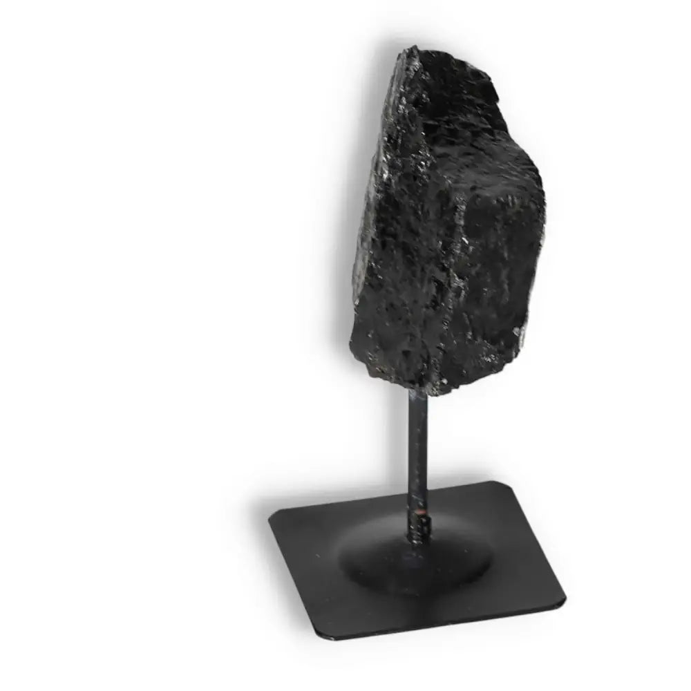 Rough Black Tourmaline on Metal Stand S from Sylvia Crystals, showcasing natural artistry and spiritual depth.