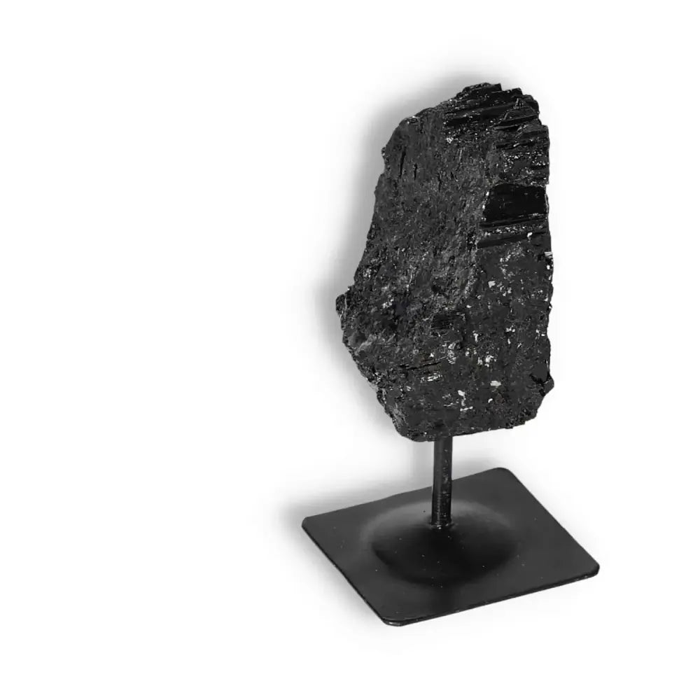 Rough Black Tourmaline on Metal Stand S for energy transformation by Sylvia Crystals, elegant decor piece that neutralizes negative energies.